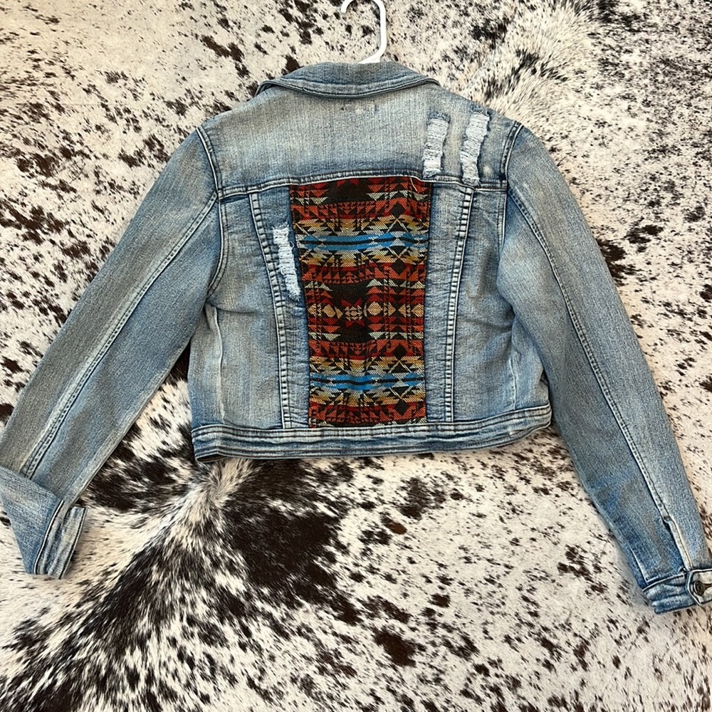 Denim jacket with Aztec patchwork